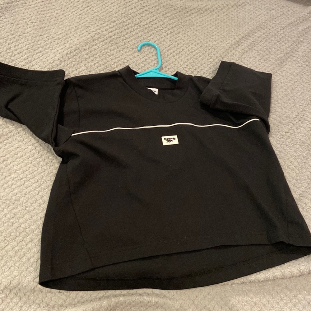 Cute Reebok 90s inspired wide drop arm sleeve